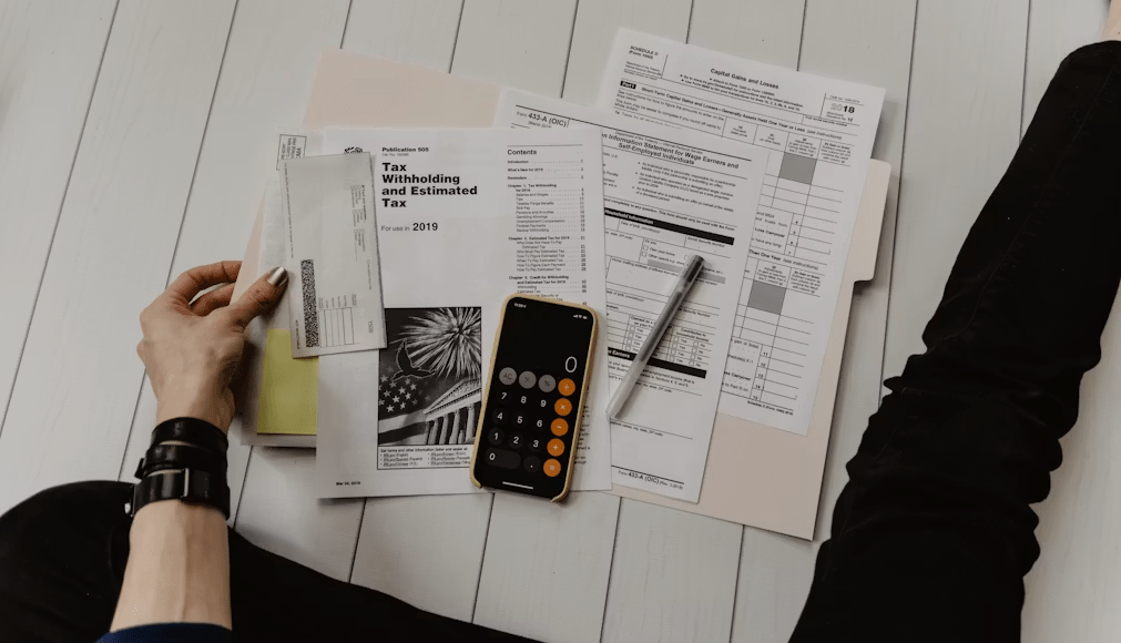 Financial analyst reviewing the income statement, balance sheet, and cash flow statement.